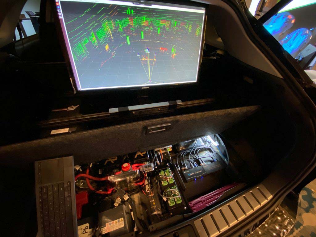 Monitor inside trunk of vehicle displaying sensor data